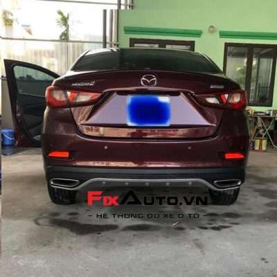 Lip pô Mazda 2