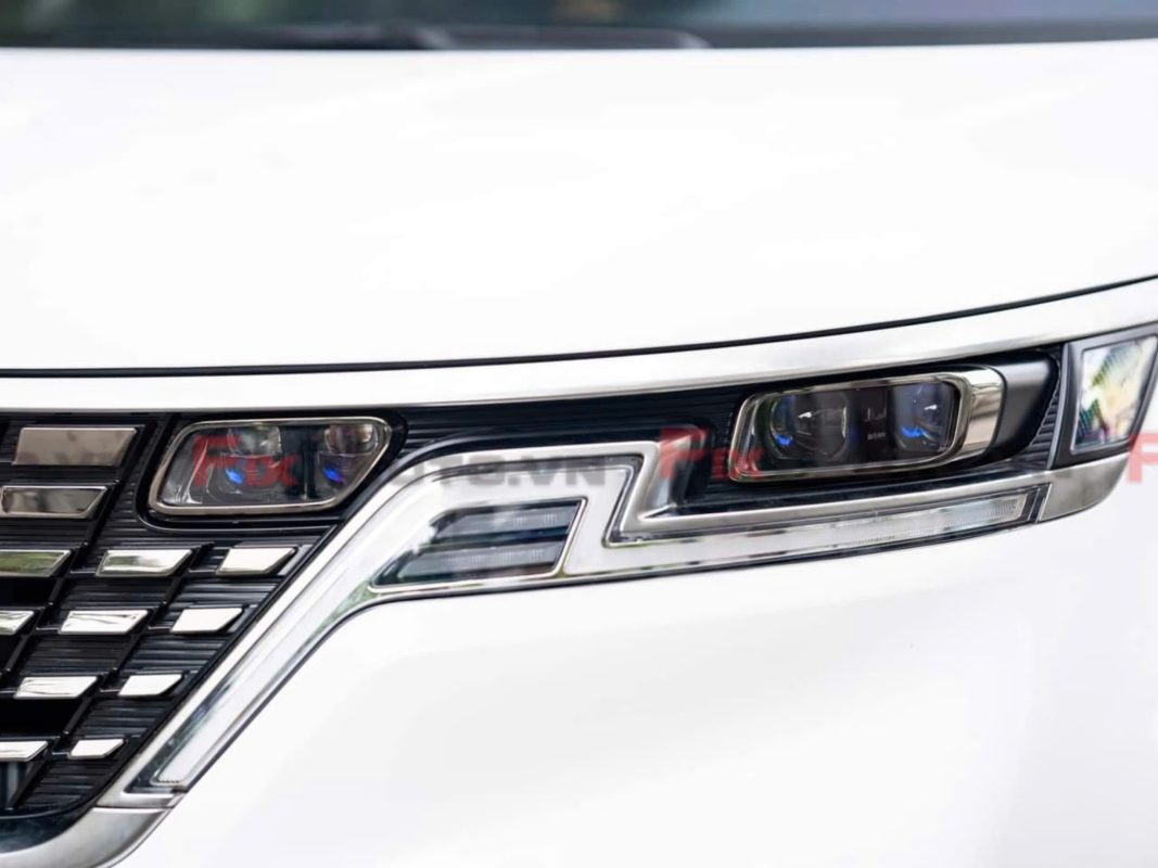 Độ đèn bi tăng sáng xe Carnival